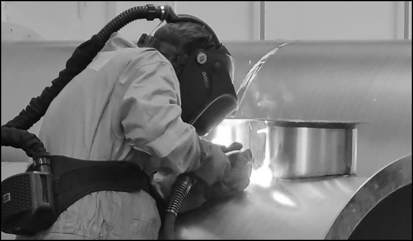 Monochrome image of welder in action